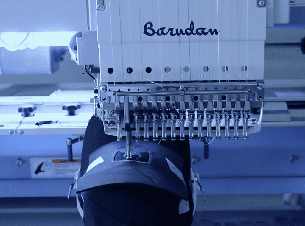 Custom Branded Workwear and Merchandise detailed embroidery service for Sports Uniform and Merchandise