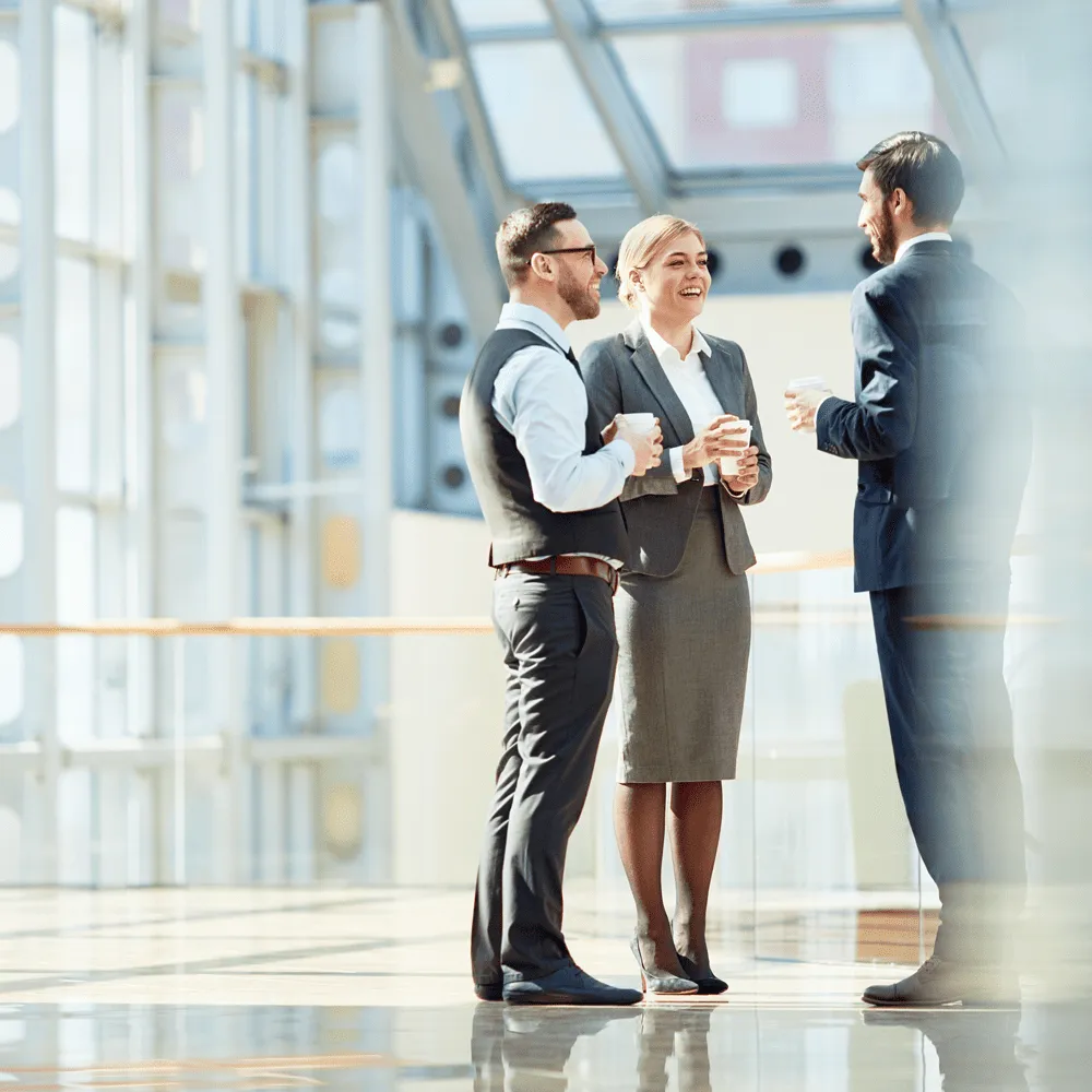 In-the-Trenches-Business-People-talking-in-hallway
