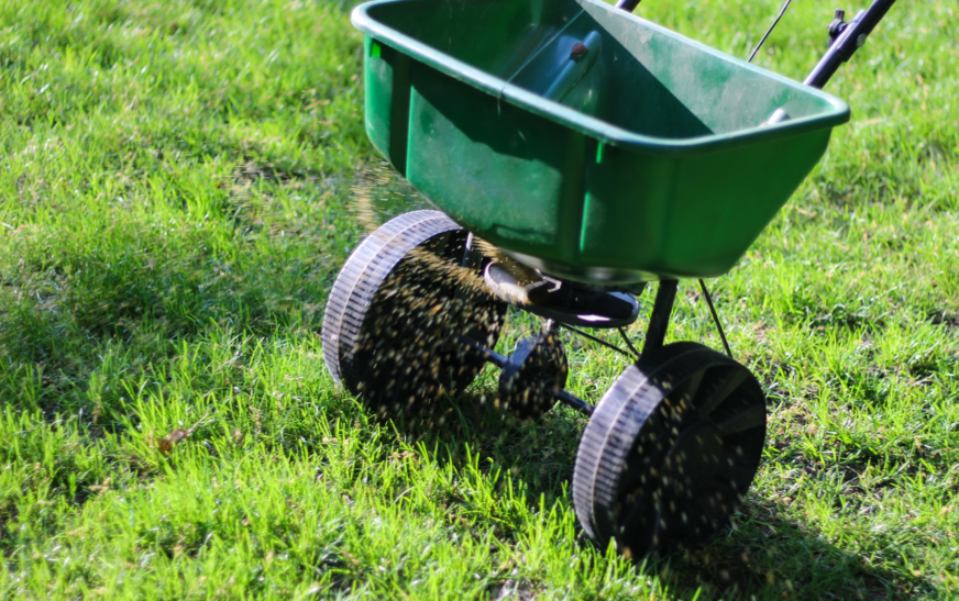 Green colored fertiliser spreader machine for Australian lawns